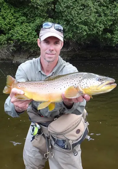 Grand River Fishing Guide Graham with a 25-inch Brown trout.