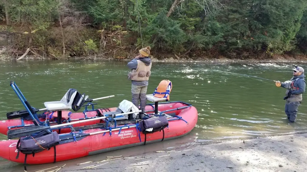 two angler fishing on a fly fishing boat for steelhead.